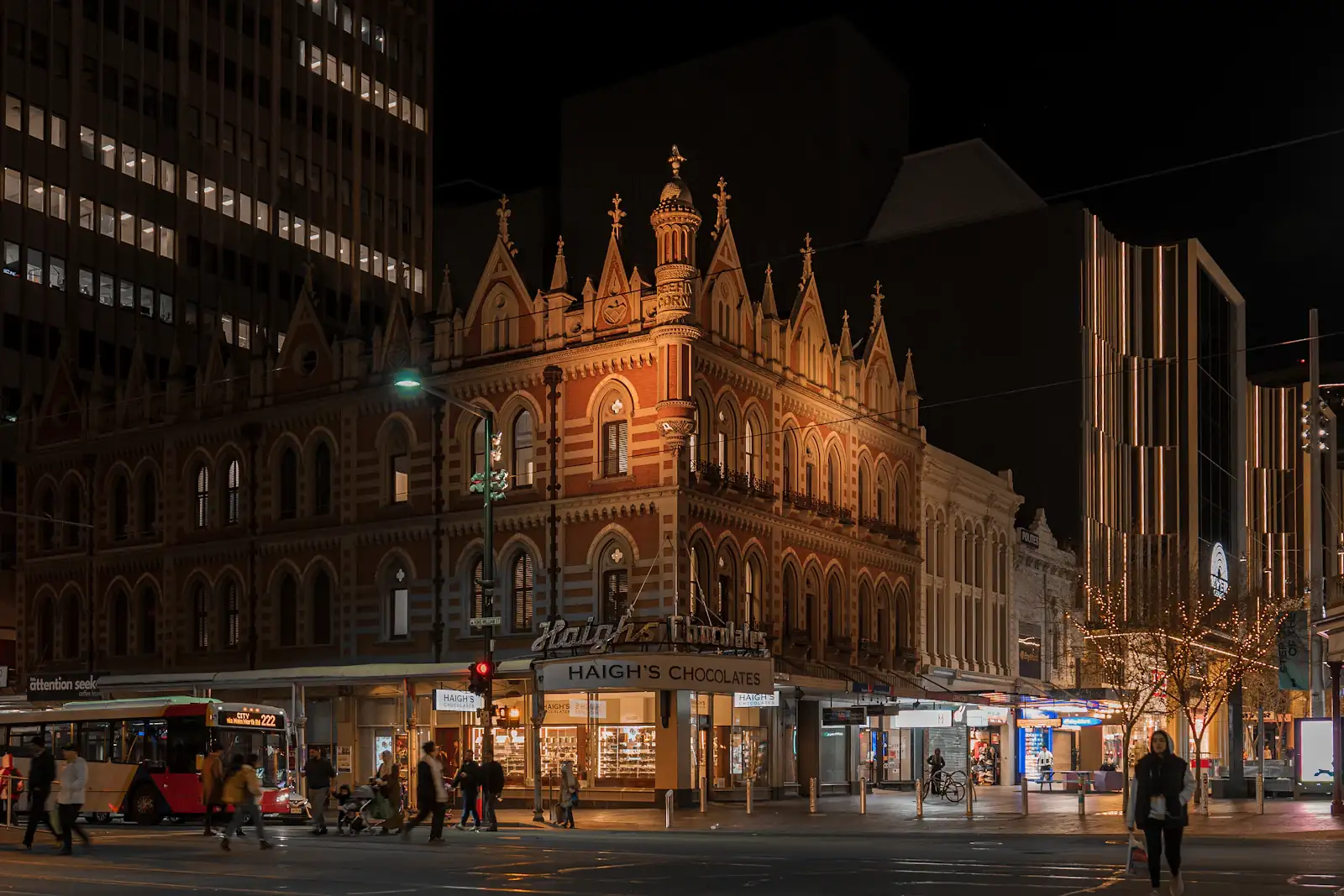 Heritage buildings along an Adelaide city street at dusk